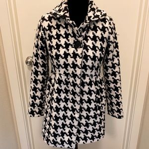 Black and white bow back pea coat.